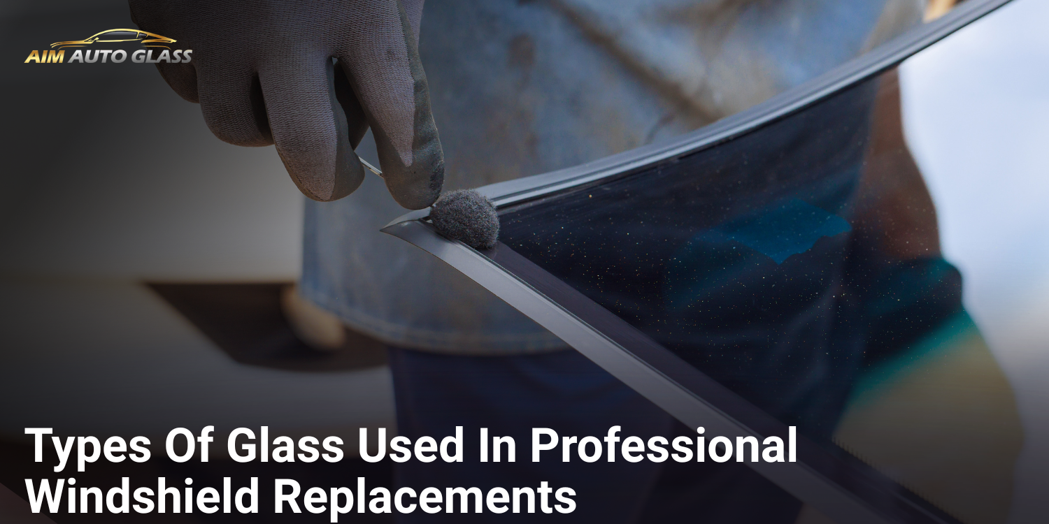 Technician comparing OEM, OEE, and aftermarket windshield glass options